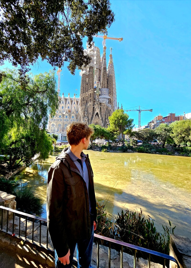 Teenager in front of La Sagrada Familia in Barcelona during his Spanish immersion programme