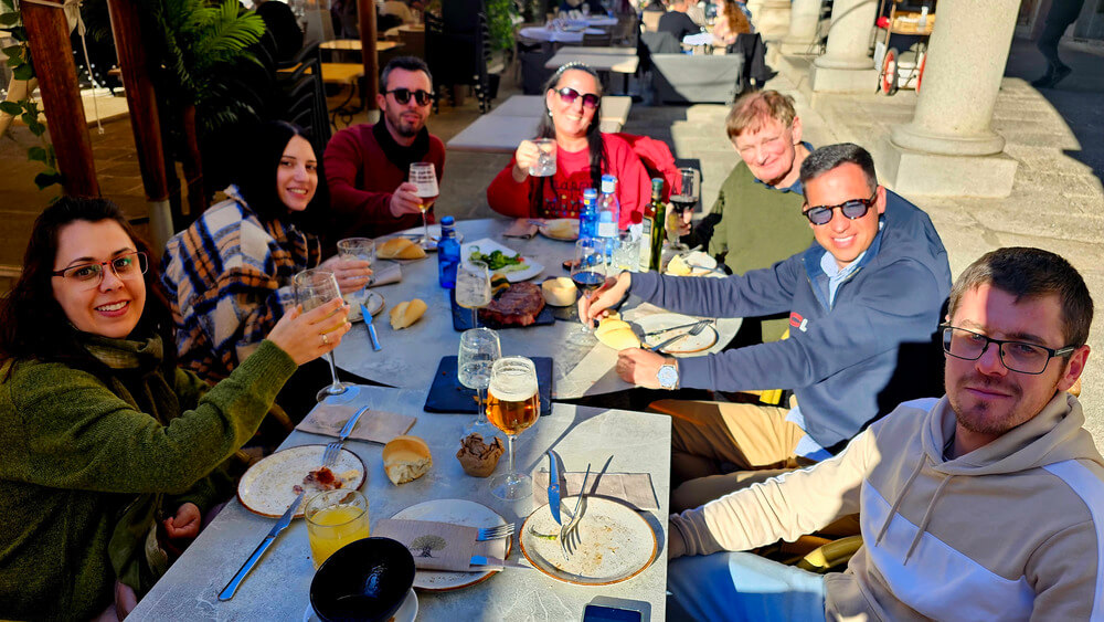 Friends sharing drinks and tapas in Extremadura, Spain